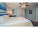 Bright bedroom featuring hardwood floors, a ceiling fan, and comfortable furnishings at 1261 Lavista Rd # N4, Atlanta, GA 30324