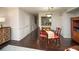Elegant dining area featuring hardwood floors, decorative wall trim, and easy access to the kitchen at 1261 Lavista Rd # N4, Atlanta, GA 30324