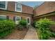 Charming brick home with a well-maintained walkway leading to the front door and beautiful landscaping at 1261 Lavista Rd # N4, Atlanta, GA 30324
