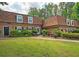 Inviting two-story townhome with a well-maintained lawn and charming landscaping at 1261 Lavista Rd # N4, Atlanta, GA 30324
