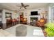 Inviting living room with a fireplace, ceiling fan, and hardwood flooring at 1261 Lavista Rd # N4, Atlanta, GA 30324
