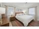 Bright bedroom with neutral decor and hardwood floors at 2049 Oakview Se Rd, Atlanta, GA 30317