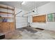 Spacious garage with storage shelving and ample room for parking and projects at 2049 Oakview Se Rd, Atlanta, GA 30317