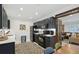 Modern kitchen with dark cabinetry, stainless steel appliances, and eat-in space at 2049 Oakview Se Rd, Atlanta, GA 30317