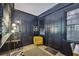 Home office space with dark walls, wood floors, and natural light at 2049 Oakview Se Rd, Atlanta, GA 30317