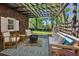 Relaxing outdoor pergola space with cozy seating and fire pit, perfect for entertaining or quiet evenings at 2049 Oakview Se Rd, Atlanta, GA 30317