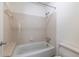 A cozy bathroom featuring a bathtub and toilet at 223 Tuxworth Cir, Decatur, GA 30033