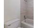A close up of the bathtub and toilet in the bathroom at 223 Tuxworth Cir, Decatur, GA 30033