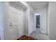 Bright entryway with tile floors, closet, and an open view to the bathroom at 223 Tuxworth Cir, Decatur, GA 30033