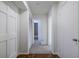 Bright hallway with a closet and a view to the bathroom with a tile floor at 223 Tuxworth Cir, Decatur, GA 30033