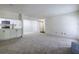 Spacious living room with modern floors, a fireplace, and open access to the kitchen at 223 Tuxworth Cir, Decatur, GA 30033