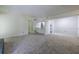 Spacious living room with new carpet and a convenient wet bar area at 223 Tuxworth Cir, Decatur, GA 30033