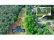 Aerial view of property in a community with golf course, highlighting its desirable location at 2973 Misty Rock Cv, Dacula, GA 30019