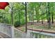 Backyard view from the deck shows the natural beauty of the property's setting at 2973 Misty Rock Cv, Dacula, GA 30019