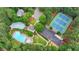 A great aerial view of the community pool, tennis courts, and the playground at 2973 Misty Rock Cv, Dacula, GA 30019