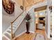 Grand foyer with soaring ceilings, staircase, and view into living spaces at 2973 Misty Rock Cv, Dacula, GA 30019