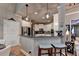 Modern kitchen with stainless steel appliances, granite countertops, and breakfast bar seating at 2973 Misty Rock Cv, Dacula, GA 30019