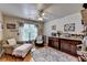 Bright living room with hardwood floors, comfortable seating, and ample storage space at 2973 Misty Rock Cv, Dacula, GA 30019
