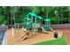 A colorful community playground with multiple slides and plenty of room for active play at 2973 Misty Rock Cv, Dacula, GA 30019