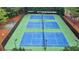 Enjoy three tennis courts perfect for recreation and exercise in a well-maintained community setting at 2973 Misty Rock Cv, Dacula, GA 30019