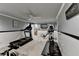 Finished basement workout room equipped with treadmill and exercise machines at 2973 Misty Rock Cv, Dacula, GA 30019