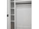 Spacious closet with built-in shelving and hanging rod, maximizing storage efficiency at 4327 Wellington Hills Ln, Snellville, GA 30039