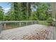 Wooden deck overlooking private backyard at 4327 Wellington Hills Ln, Snellville, GA 30039