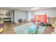 Spacious basement area with hardwood floors and neutral walls ideal for and activities at 9465 Grande Dr, Winston, GA 30187