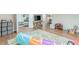 Versatile basement area with an open floor plan and hardwood flooring, providing ample space for various uses at 9465 Grande Dr, Winston, GA 30187