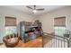 Charming bedroom with sports-themed decor, bunk beds, and windows with natural light at 9465 Grande Dr, Winston, GA 30187