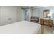 Functional bedroom with a large closet, neutral walls, and minimalist decor, providing a serene retreat at 9465 Grande Dr, Winston, GA 30187