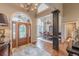 Inviting home foyer featuring hardwood floors, a chandelier, and an elegant entrance at 9465 Grande Dr, Winston, GA 30187