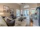 Inviting living room with high ceilings, fireplace, and comfortable seating area at 9465 Grande Dr, Winston, GA 30187