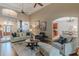 Open-concept living room with hardwood floors and ample natural light at 9465 Grande Dr, Winston, GA 30187