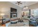 Cozy living room with brick fireplace and elegant decor at 9465 Grande Dr, Winston, GA 30187