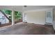 Spacious carport with brick wall and two entry doors at 2732 Elkhorn Dr, Decatur, GA 30034