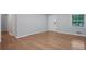 Bright and airy living room featuring hardwood floors, a large window, and neutral paint at 2732 Elkhorn Dr, Decatur, GA 30034