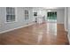 Spacious living and dining area with gleaming hardwood floors and natural light, perfect for gatherings at 2732 Elkhorn Dr, Decatur, GA 30034