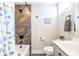Modern bathroom with tiled shower-tub combination, and sleek vanity at 834 S Columbia Dr, Decatur, GA 30030