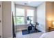 A sunlit bedroom space featuring an exercise bike at 834 S Columbia Dr, Decatur, GA 30030