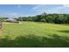 Expansive grassy community grounds featuring an open recreation area with a field house and wooded perimeter at 834 S Columbia Dr, Decatur, GA 30030