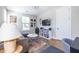 Inviting living room featuring sofa, workspace and vinyl record storage at 834 S Columbia Dr, Decatur, GA 30030