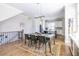 Open concept living space features hardwood floors, a dining area, and a modern kitchen design at 834 S Columbia Dr, Decatur, GA 30030