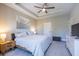 The main bedroom features tray ceiling, a door and neutral decor at 834 S Columbia Dr, Decatur, GA 30030