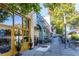 Charming storefronts along a sidewalk, featuring boutiques and cafes with outdoor seating at 834 S Columbia Dr, Decatur, GA 30030