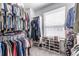 This spacious walk-in closet has lots of hanging and shelf space at 834 S Columbia Dr, Decatur, GA 30030