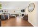 Spacious living room with hardwood floors, cozy fireplace, and ample natural light at 111 Centennial Ridge Dr, Acworth, GA 30102