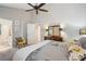 Bedroom featuring large windows and an ensuite bathroom at 141 Springbrooke Trl, Dallas, GA 30157