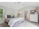Bright bedroom with vaulted ceiling, plush carpet, and neutral color palette at 141 Springbrooke Trl, Dallas, GA 30157