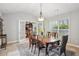 Dining room offers bright light and backyard views at 141 Springbrooke Trl, Dallas, GA 30157